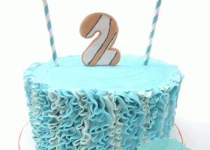 custom cake vancouver, finding nemo cake, blue ruffle cake, blue and orange cake, bunting